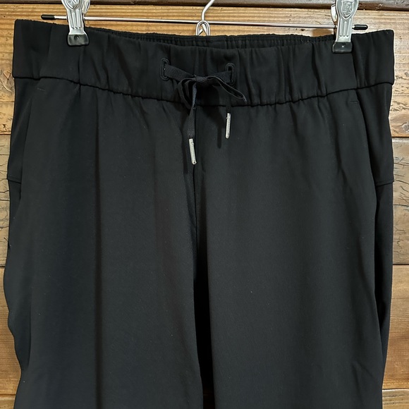 LULULEMON Black Drawstring On The Fly Woven Travel Pants Size 6 - Picture 8 of 9